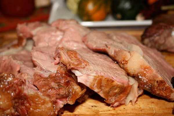 Smoked Prime Rib, Sliced and Ready To Serve Medium Rare, Smoked Prime Rib Slices on Board