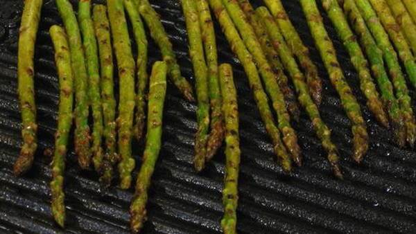 Grilling Asparagus Spears On a Cast Iron Griddle