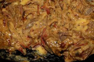 Smoked Brisket With Melted Cheese, Ready For Making Sandwiches Heating the Cheese and Smoked Brisket Mixture
