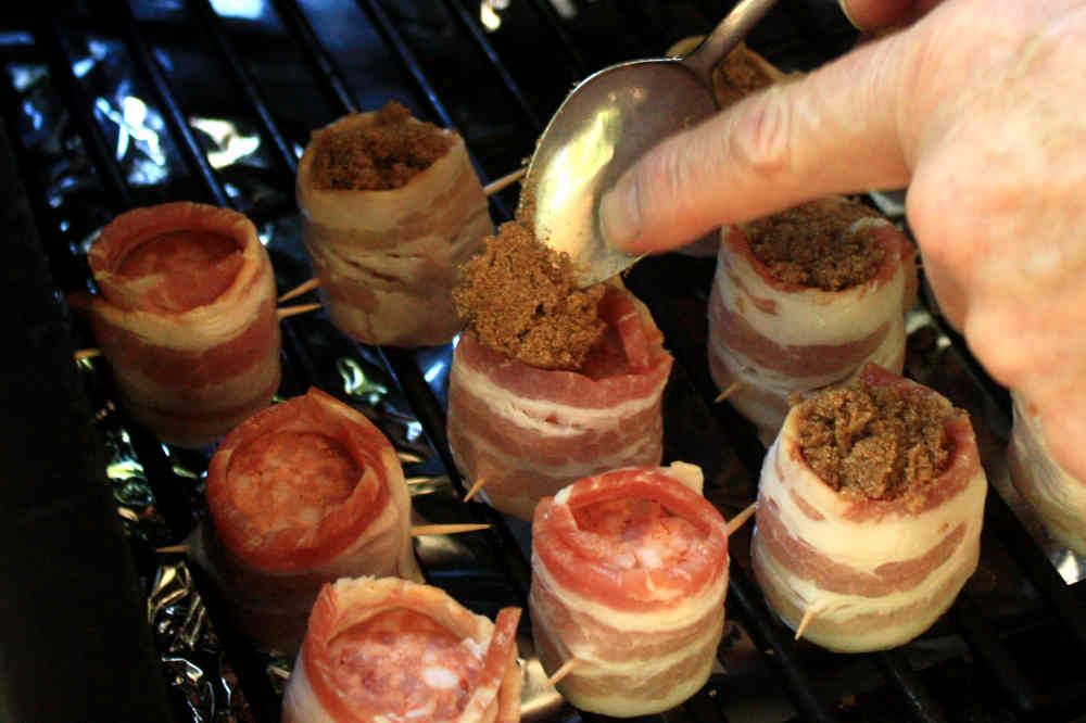 Add plenty of brown sugar into the tops for a great shot of sweet ecstasy. These are incredibly tasty! Filling tops with dark brown sugar.