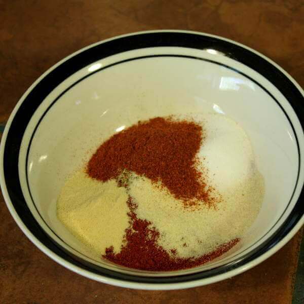 A Bowl Containing Various Seasonings, Waiting Patiently To Be Combined Into a Tasty Cajun Chicken Rub