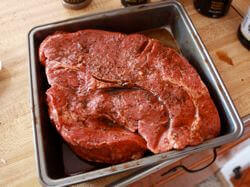 Marinated Chuck Roast In Pan, Before Being Seasoned With Rub Mix Marinated Beef Chuck Roast, Ready To Season With Dry Rub