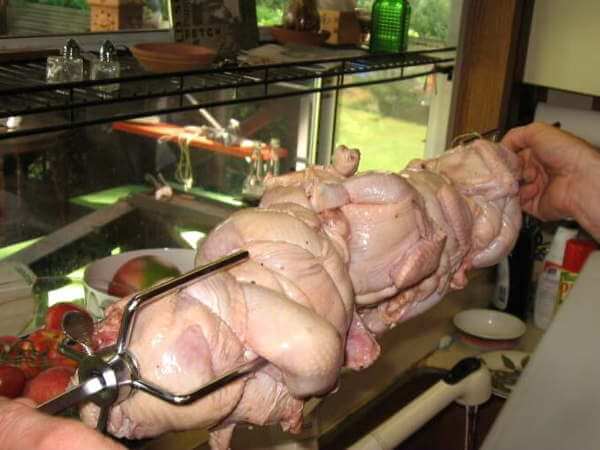 A ConQuin Splork On a Rotisserie Shaft, Ready For Grilling