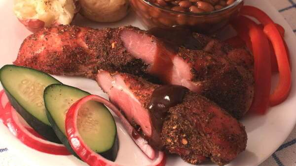 Country Style Ribs Are The Main Attraction On This Attractive Serving Dish. Veggies Round Out The Meal! A Beautiful Plate, Filled With Smoked Country Style Ribs, Cucumbers, Onions, Red Bell Pepper and Potatoes