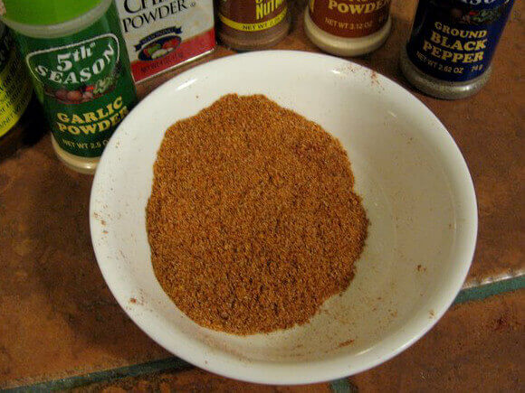 Dry Rub Ingredients Behind Bowl Of Mixed Rub