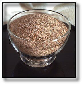 Dry Rub Mix In Bowl, Sitting On Black Dish Dry Rub In Clear Glass Bowl On Black Plate