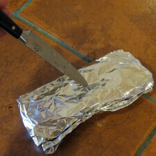 turkey foil tips smoker smoking pack wood smoke using holes prick chip few