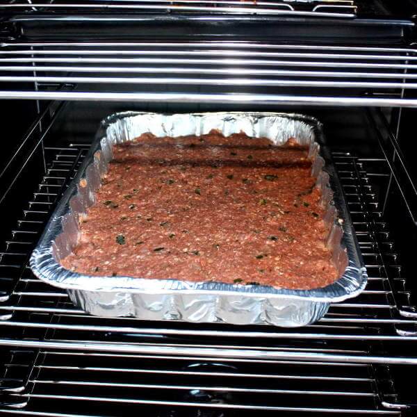 Meatloaf That Just Went Into The Smoker, Pressed Into a Disposable Aluminum Pan, In a CharBroil Propane Smoker