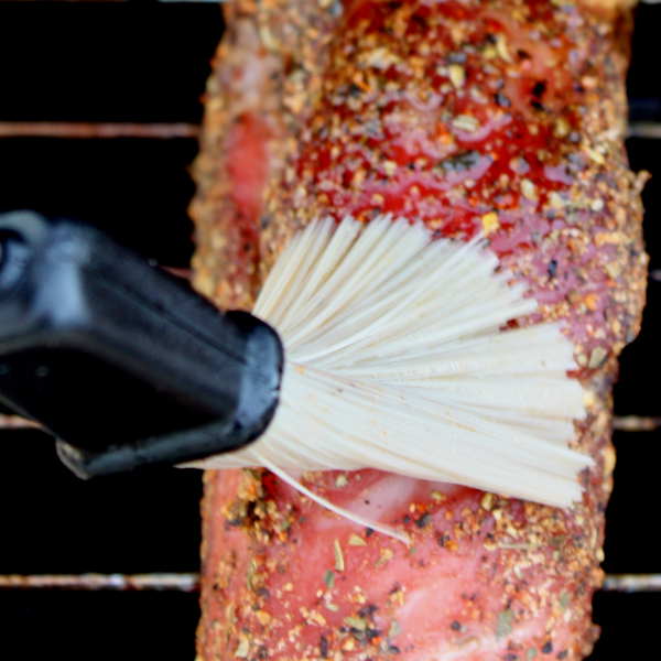 Brushing Mopping Sauce On Pork Country Style Ribs