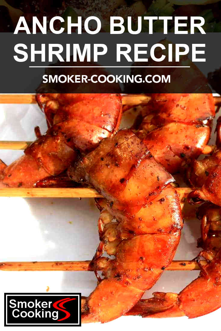 Image of several seasoned spicy grill-smoked ancho butter shrimp on bamboo skewers, caption overlay reading Ancho Butter Shrimp Recipe. Pin for later