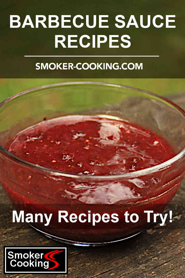 Red barbecue sauce fills a clear glass bowl that is placed on an outdoor picnic table. Pin for later