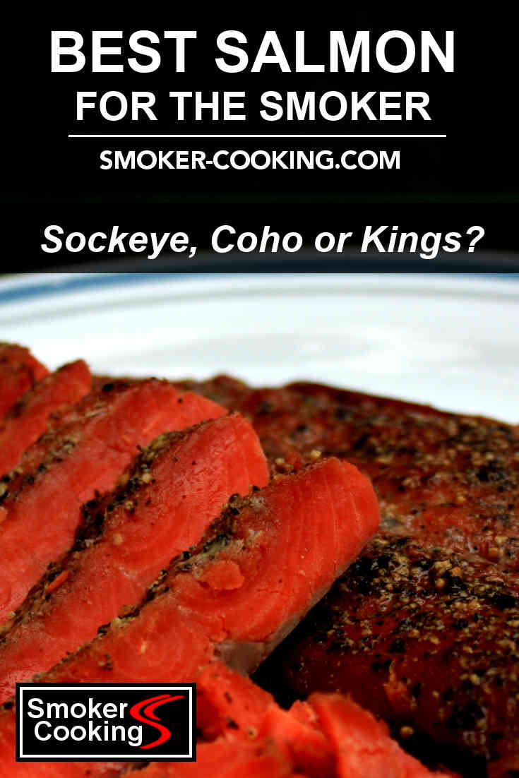 Herb crusted, hot smoked sockeye salmon fillet on platter, sliced and showing beautiful reddish-orange interior.