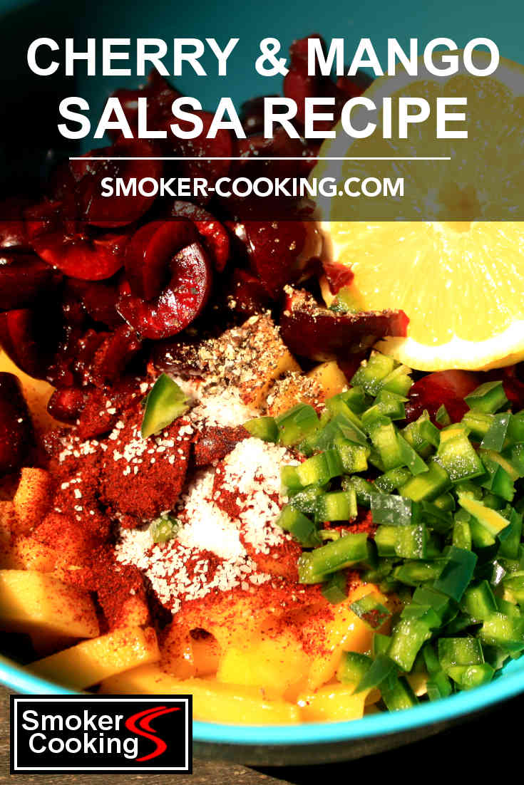 Blue bowl filled with cherry and mango salsa ingredients. Very colorful! Pin for later