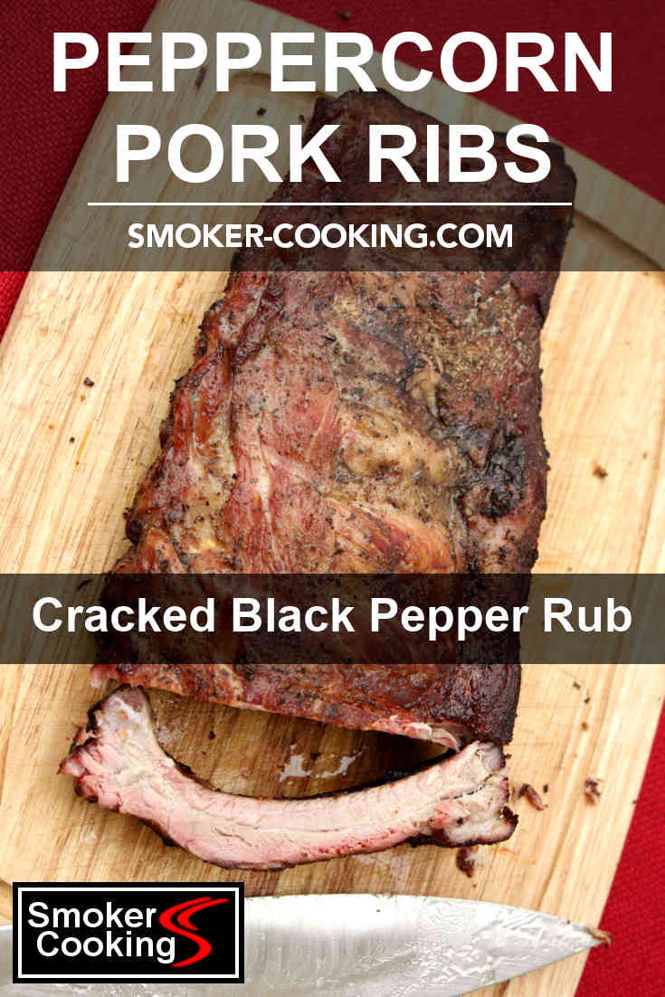 A slab of pork ribs, seasoned with peppercorn rub, smoked to perfection and being cut on a bamboo board. Pin to save
