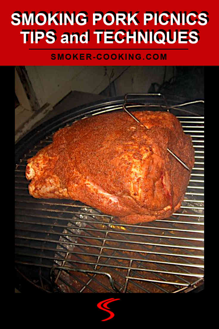A well seasoned pork picnic roast on the top grate of a Weber smoker. A temperature probe is inserted into the pork to monitor internal temperature.