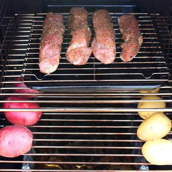 Red and White Potatoes Being Smoked Along With Country Style Pork Ribs