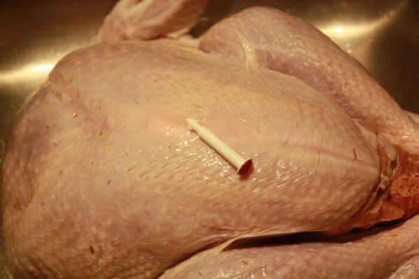 A Whole Raw Turkey In Kitchen Sink, Pop Up Indicator Removed