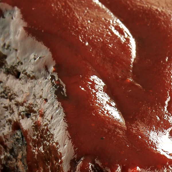 Texas style Barbecue Sauce Glopped On Smoked Brisket