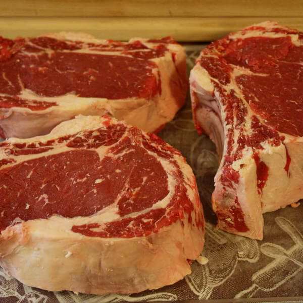 Ribeye Steaks Just Like Grampa Cooked Over Wood Coals, and Served With Butter.