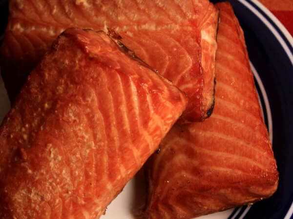 Atlantic Salmon Fillets, Alder Smoked, On Blue-Edged Serving Plate Smoked Atlantic Salmon on Round Serving Dish