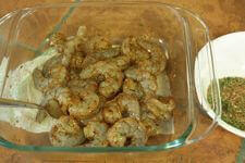 Seasoning White Shrimp With Ancho Pepper Rub Mix Before Grilling Shrimp In Pyrex Baking Dish, Seasoned For Grilling