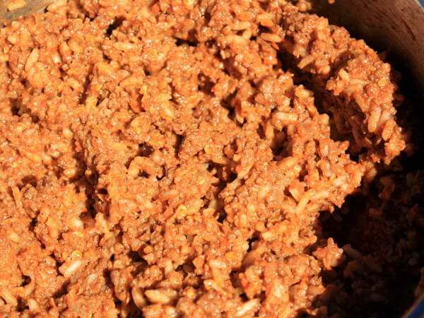 Prepared Bell Pepper Stuffing In a Saucepan, Before Being Packed Into The Peppers Prepared Pepper Stuffing Mixture Consisting of Cooked Ground Beef, Sauted Onions, Spices, Eggs, Rice and Oatmeal.