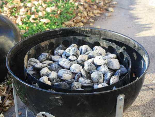 Weber Smokey Mountain Charcoal Ring, Filled With Burning Charcoal Briquettes