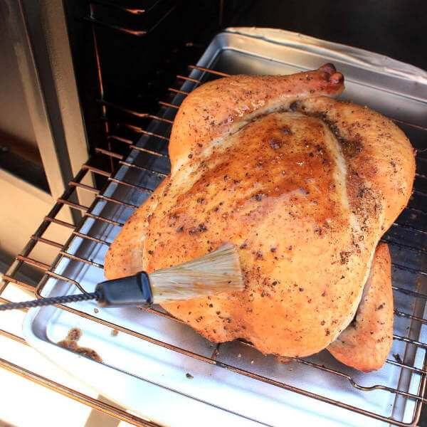 Basting a Whole Chicken That's Being Smoked In a Char-Broil Propane Smoker
