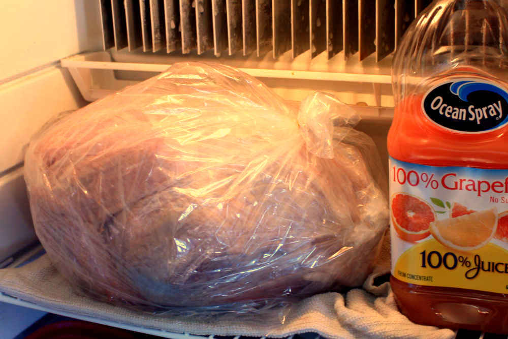 Dry brining a small whole turkey in a bag, in the refrigerator.